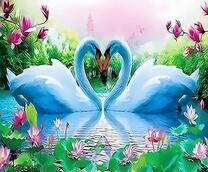 Пара лебедей на озере с лотосами