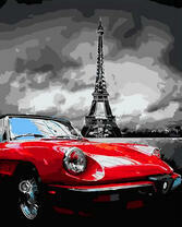 Красное авто на фоне Эйфелевой башни в Париже