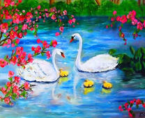 Лебеди с птенцами на озере