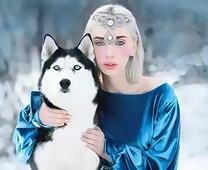 Беловолосая девушка в синем платье с собакой