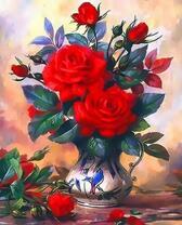 Букетик красных роз в кофейном кувшине