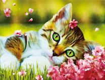 Котёнок в весенней травке и цветах