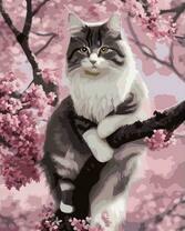 Пушистый кот на цветущем дереве