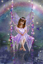 Ангелочек на качеле из цветов