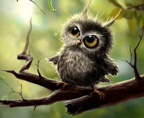 Пушистый совенок на ветке