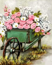 Зеленая тележка полная цветов