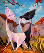 Белая и черная кошечка на улице города