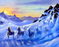 Стадо лошадей в заснеженных горах