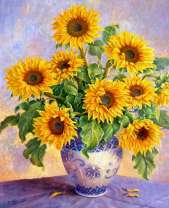 Маленькие подсолнухи в розовой вазе