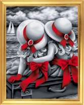 Маленькие девочки с красными бантами у моря