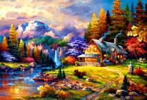 Дом в осеннем лесу среди гор