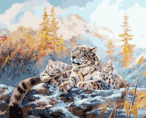 Семья снежных барсов в осеннем лесу