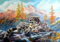 Белые леопарды на фоне гор