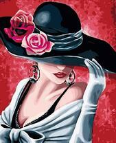 Элегантная девушка в шляпе и перчатках