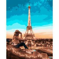 Девушка и огни ночного Парижа