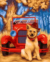 Пёсик возле ретро-автомобиля