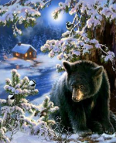 Черный медвежонок под деревом