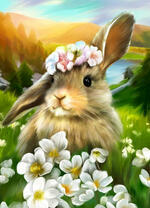 Кролик среди цветов и зеленой травы