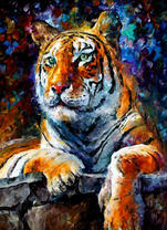 Тигр на большом камне