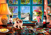 Котята играют на столе