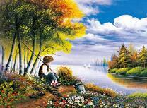 Мальчик на осеней рыбалке