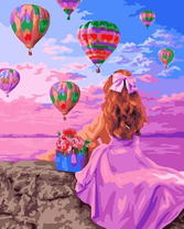 Девочка наблюдает за воздушными шарами