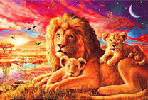 Львята со львом у реки на закате