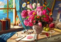 Букет с ярких летних цветов на столе с красками